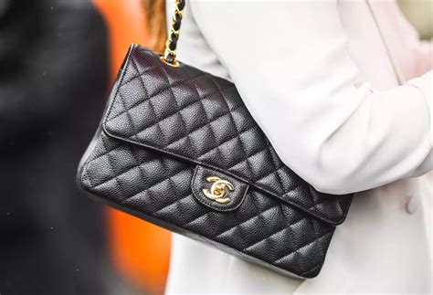 girl holding chanel bag|chanel bag cost.